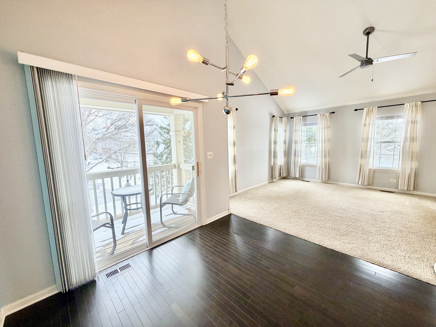 898 Emerald Drive Pingree Grove, IL 60140 - Photo 7 of 23 a view of an empty room with wooden floor and a window