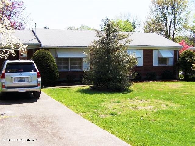 10907 Deering Road Louisville, KY 40272 - Photo 4 of 38 Front View of this 3 Bedroom, 1 Bath home with a fully fenced back yard, 1 Car Carport, spacious Eat-in Kitchen, security system (not hooked up at this time), hardwood throughout the home underneath the carpeting, large Living Room, Dining Room and is clean as a whistle!!