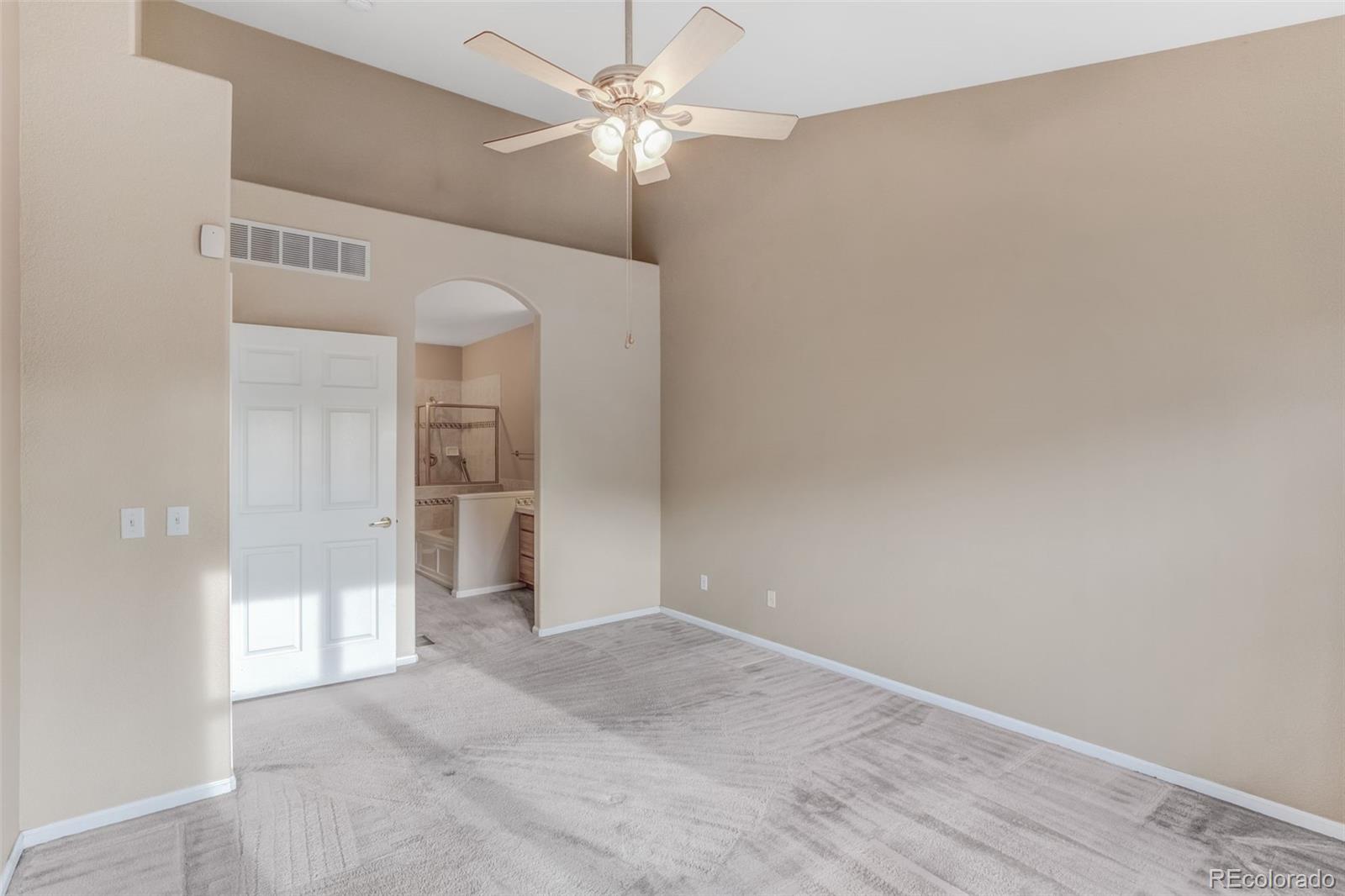 6656 South Reed Way, Unit B Littleton, CO 80123 - Photo 12 of 32 wooden floor in an empty room