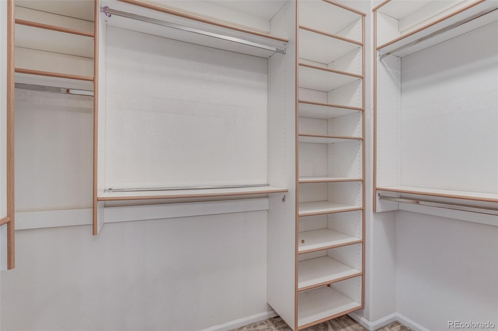 6656 South Reed Way, Unit B Littleton, CO 80123 - Photo 16 of 32 a view of an empty walk in closet