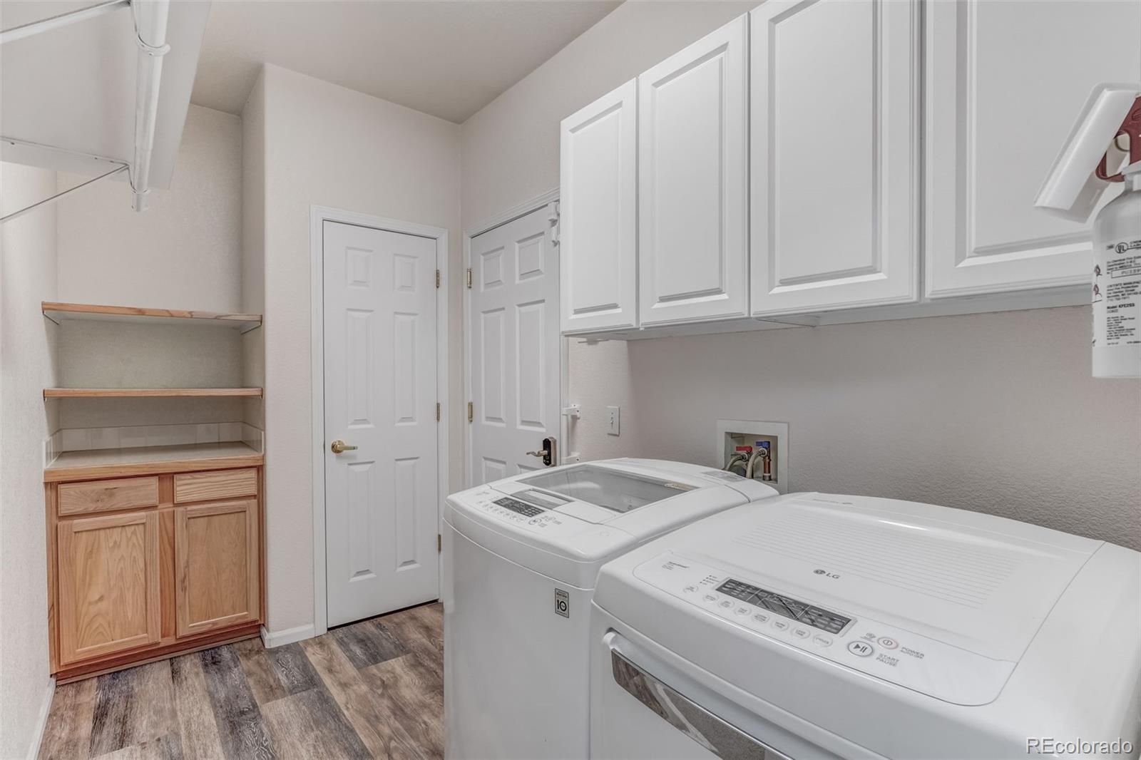 6656 South Reed Way, Unit B Littleton, CO 80123 - Photo 21 of 32 a utility room with dryer and washer