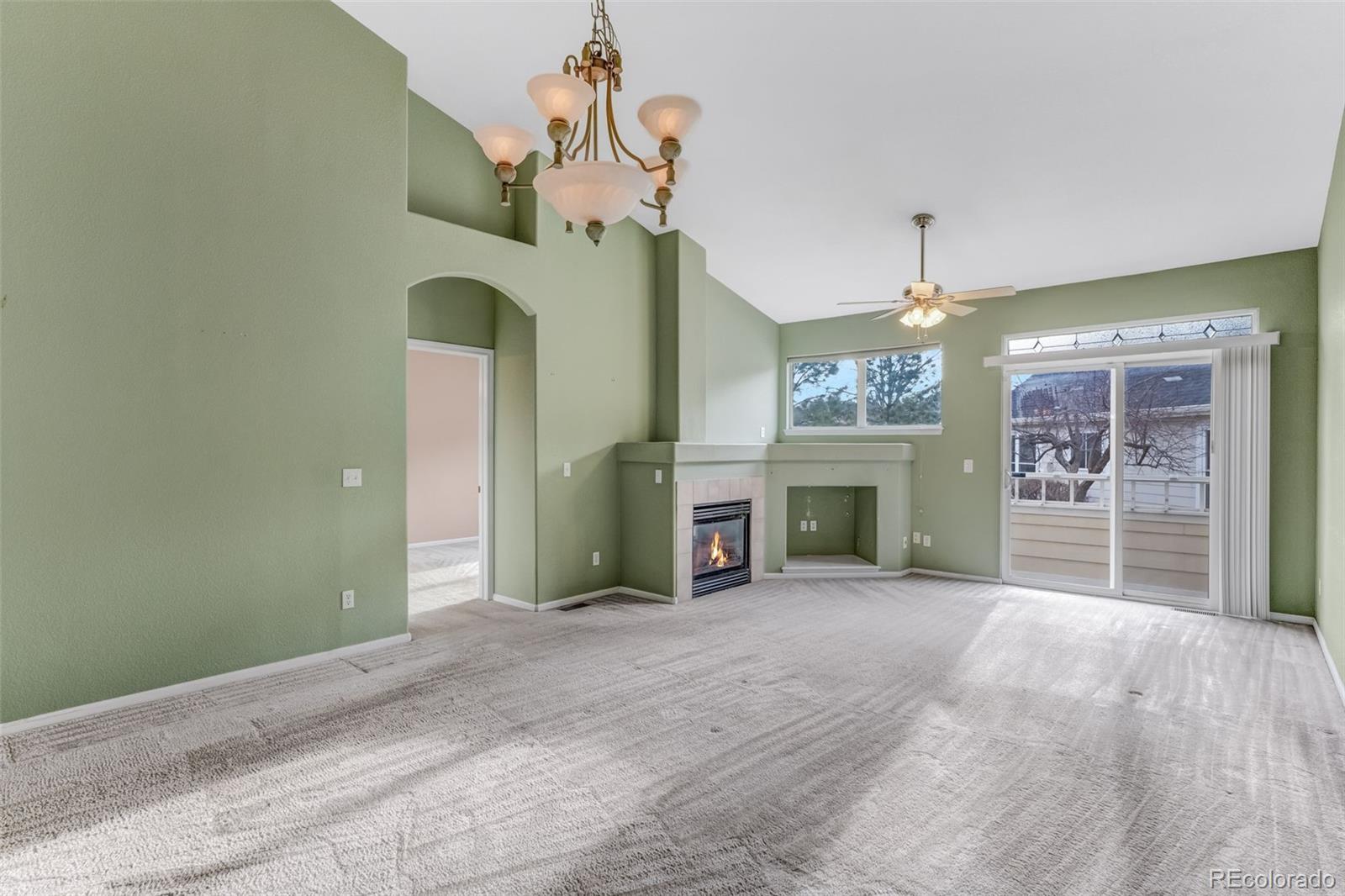 6656 South Reed Way, Unit B Littleton, CO 80123 - Photo 4 of 32 a view of a livingroom with a fireplace