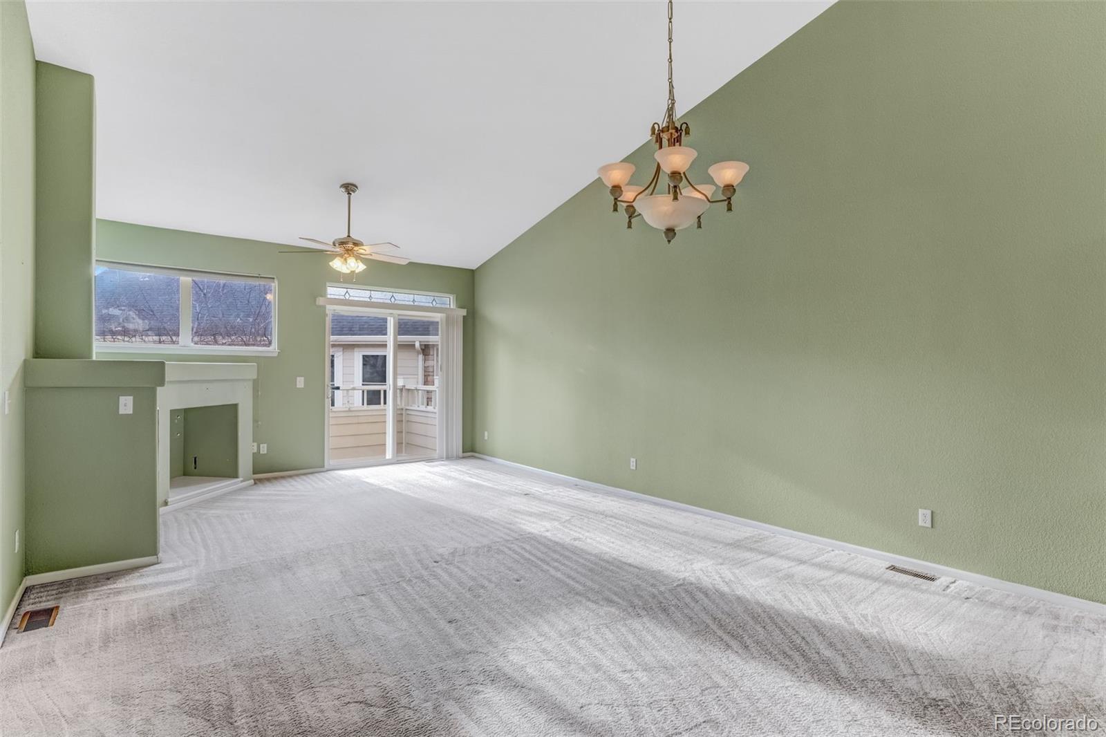 6656 South Reed Way, Unit B Littleton, CO 80123 - Photo 6 of 32 a view of livingroom with window