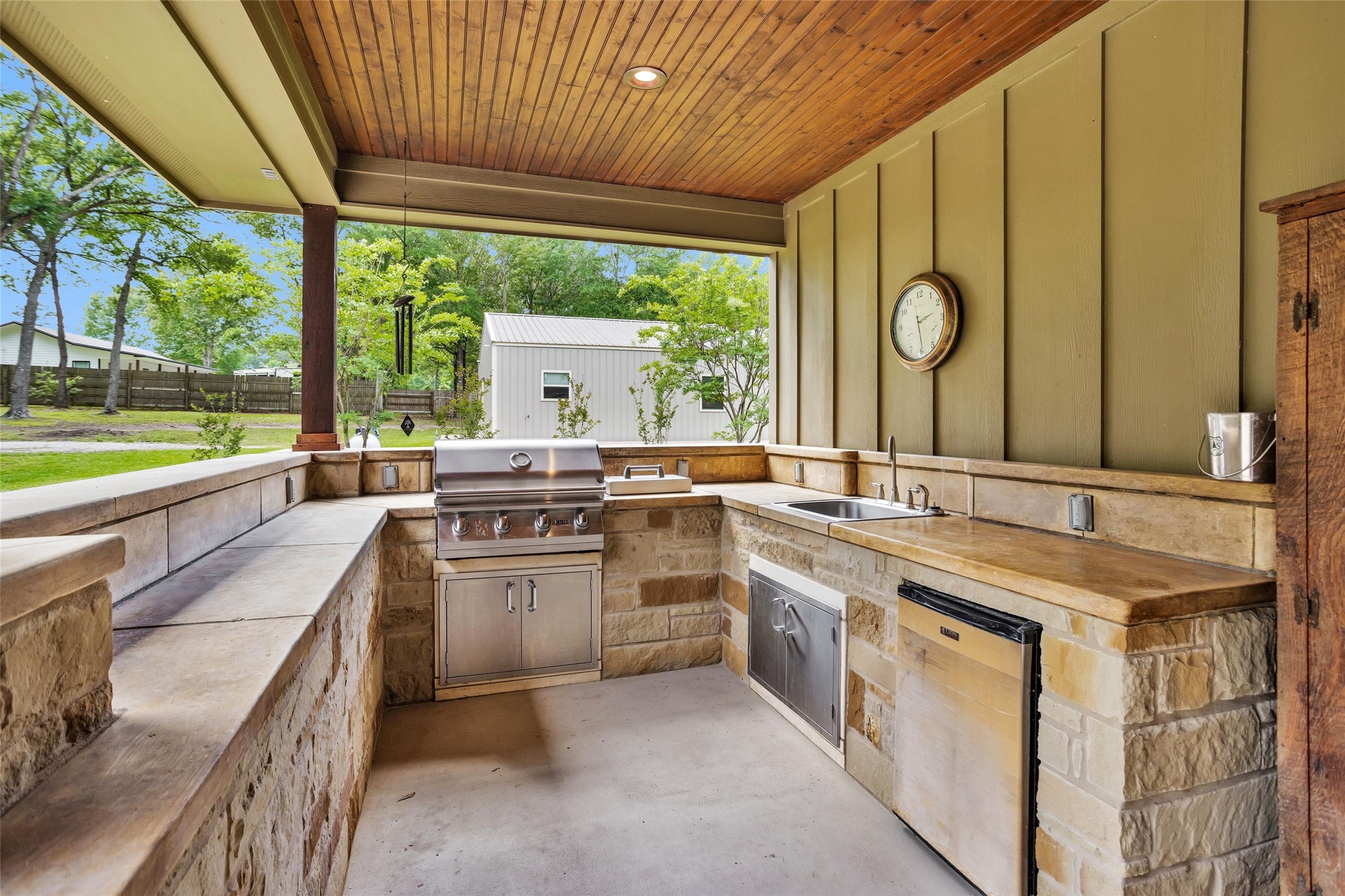 11781 Walding Road Montgomery, TX 77356 - Photo 31 of 47 Enjoy the outdoors all year long with this covered outdoor kitchen!