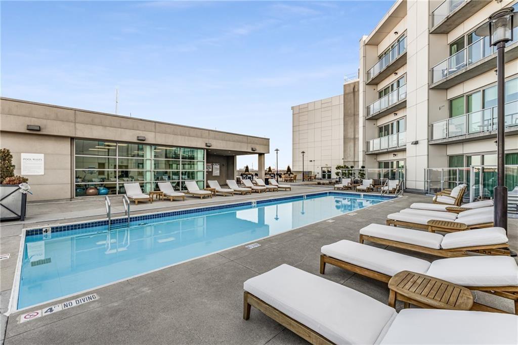 1100 Howell Mill Road Northwest, Unit 917 Atlanta, GA 30318 - Photo 16 of 22 a view of pool with outdoor seating