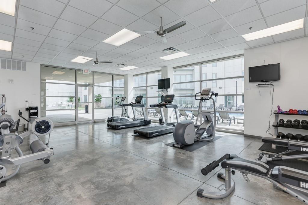 1100 Howell Mill Road Northwest, Unit 917 Atlanta, GA 30318 - Photo 17 of 22 a view of a room with gym equipment