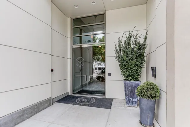 a bench sitting in front of a building