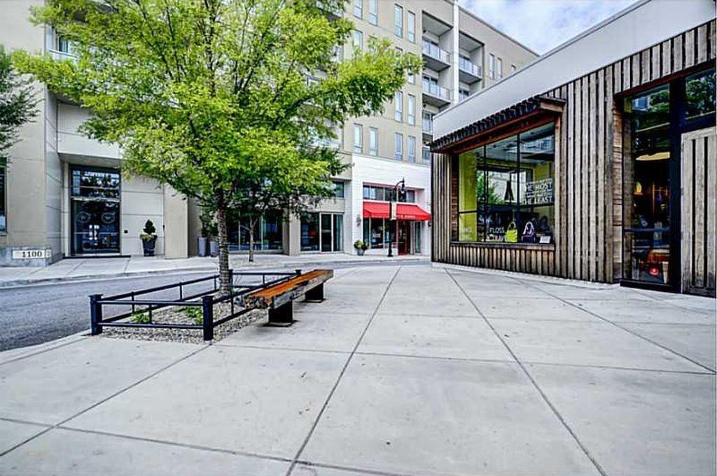 1100 Howell Mill Road Northwest, Unit 917 Atlanta, GA 30318 - Photo 21 of 22 a bench sitting in front of a building