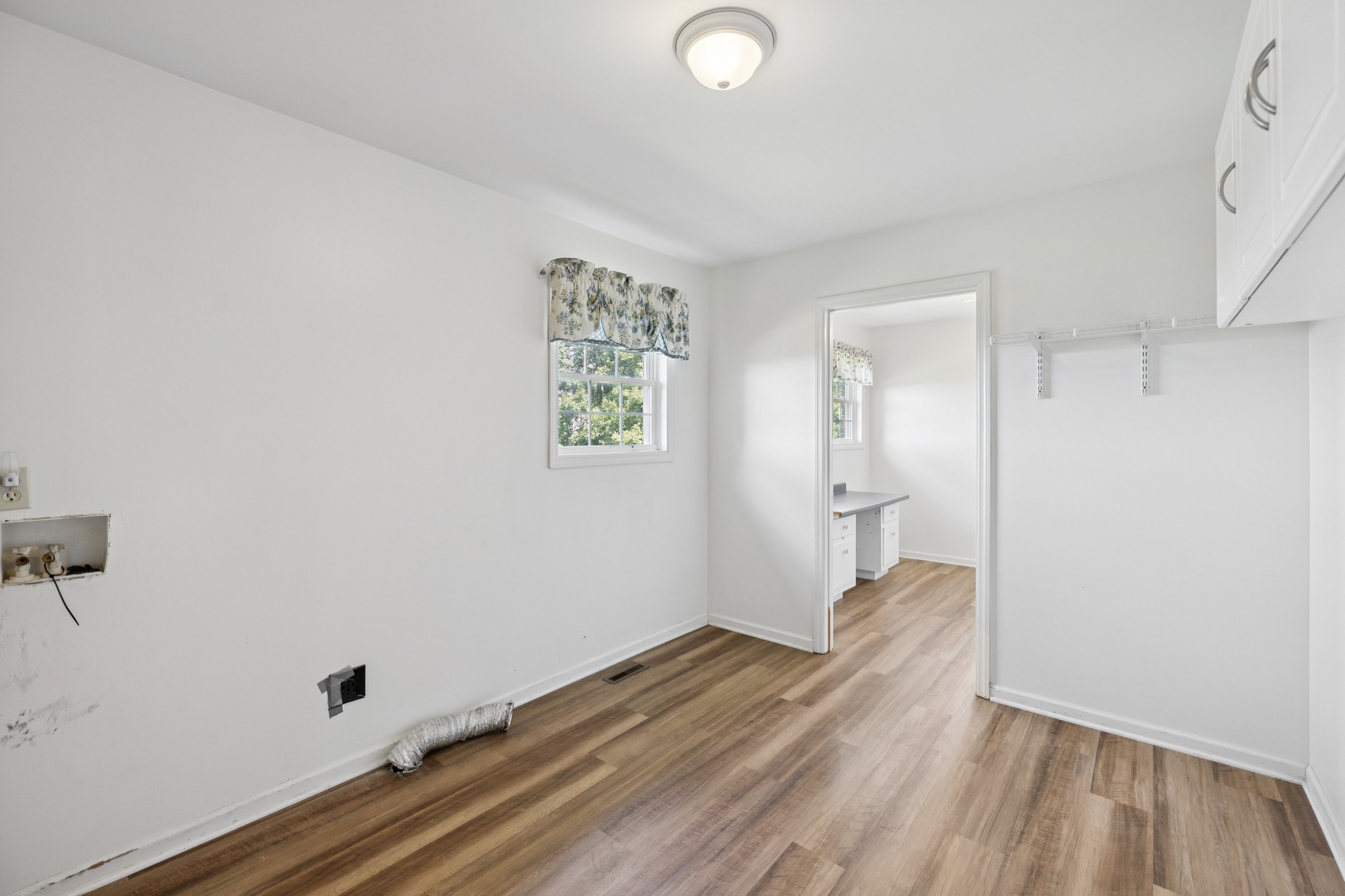 7365 Rowe Gap Road Belvidere, TN 37306 - Photo 22 of 78 a view of a room with wooden floor and white walls