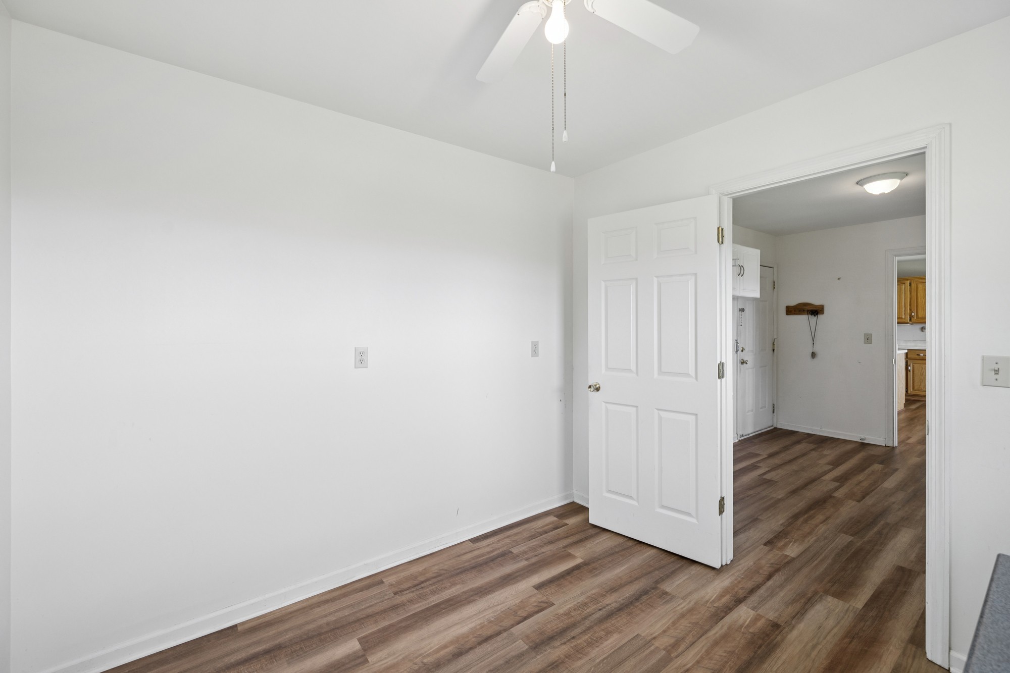 7365 Rowe Gap Road Belvidere, TN 37306 - Photo 25 of 78 wooden floor in an empty room with a window