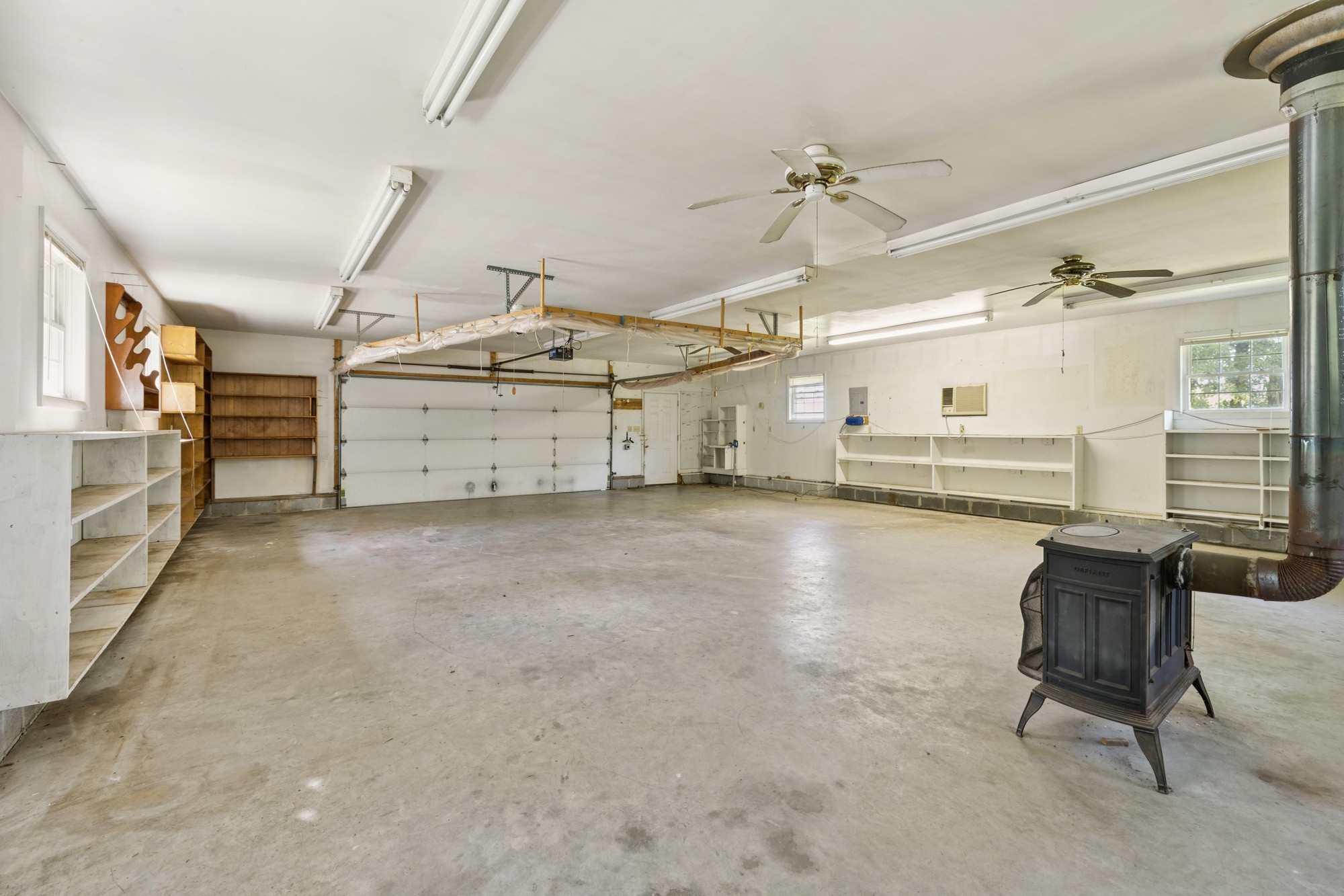 7365 Rowe Gap Road Belvidere, TN 37306 - Photo 45 of 78 a view of a livingroom with furniture and a ceiling fan