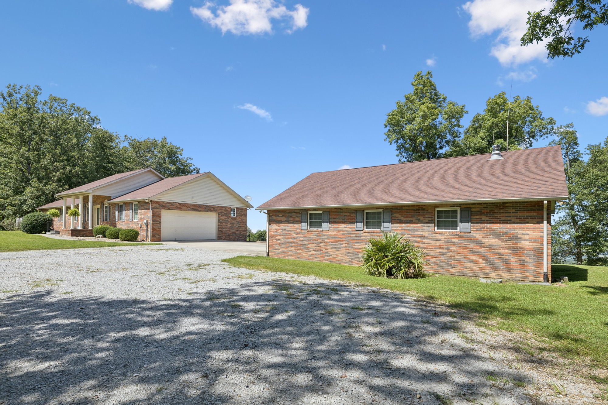7365 Rowe Gap Road Belvidere, TN 37306 - Photo 50 of 78 a view of a house with a yard and large tree
