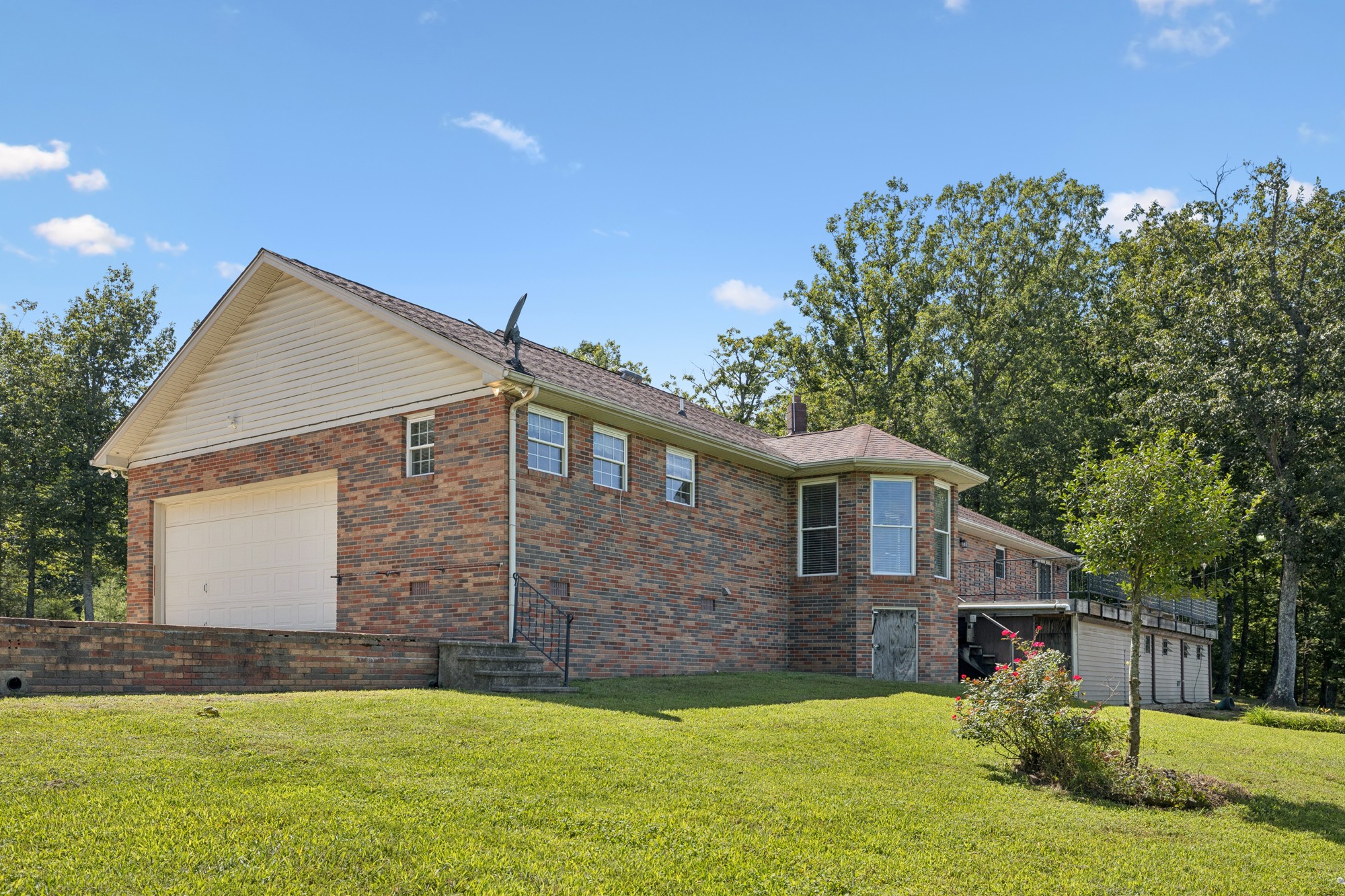 7365 Rowe Gap Road Belvidere, TN 37306 - Photo 52 of 78 a front view of a house with a yard