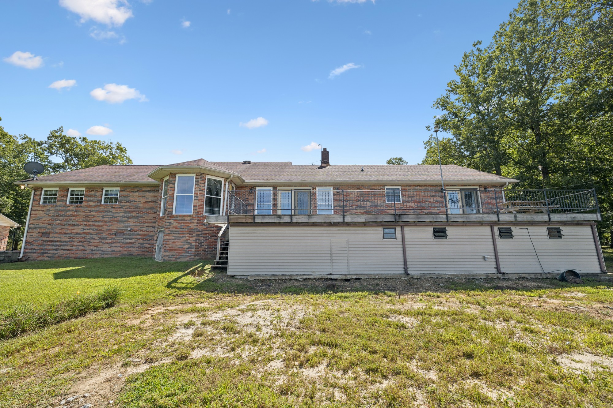 7365 Rowe Gap Road Belvidere, TN 37306 - Photo 59 of 78 a front view of a house with a yard