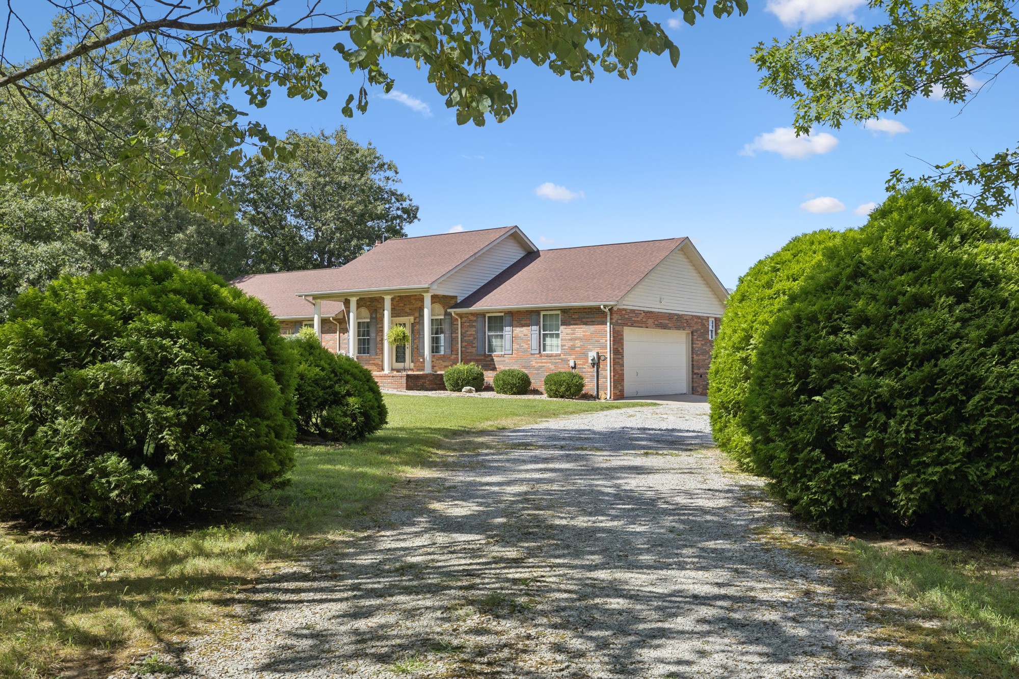 7365 Rowe Gap Road Belvidere, TN 37306 - Photo 7 of 78 a front view of a house with a yard