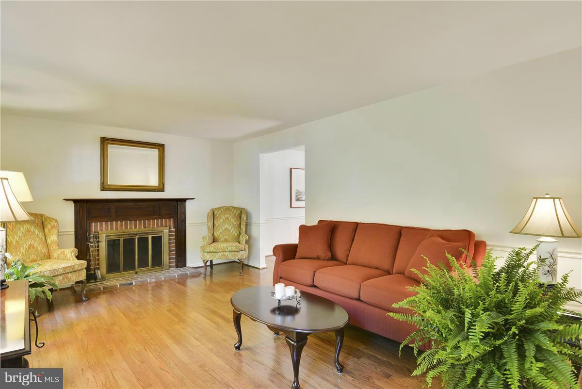 2507 Soapstone Drive Reston, VA 20191 - Photo 4 of 30 Living Room with wood burning fireplace