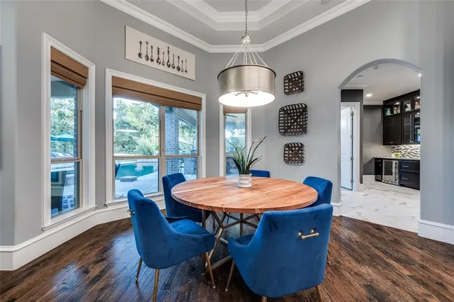 a kitchen with a stove and a refrigerator