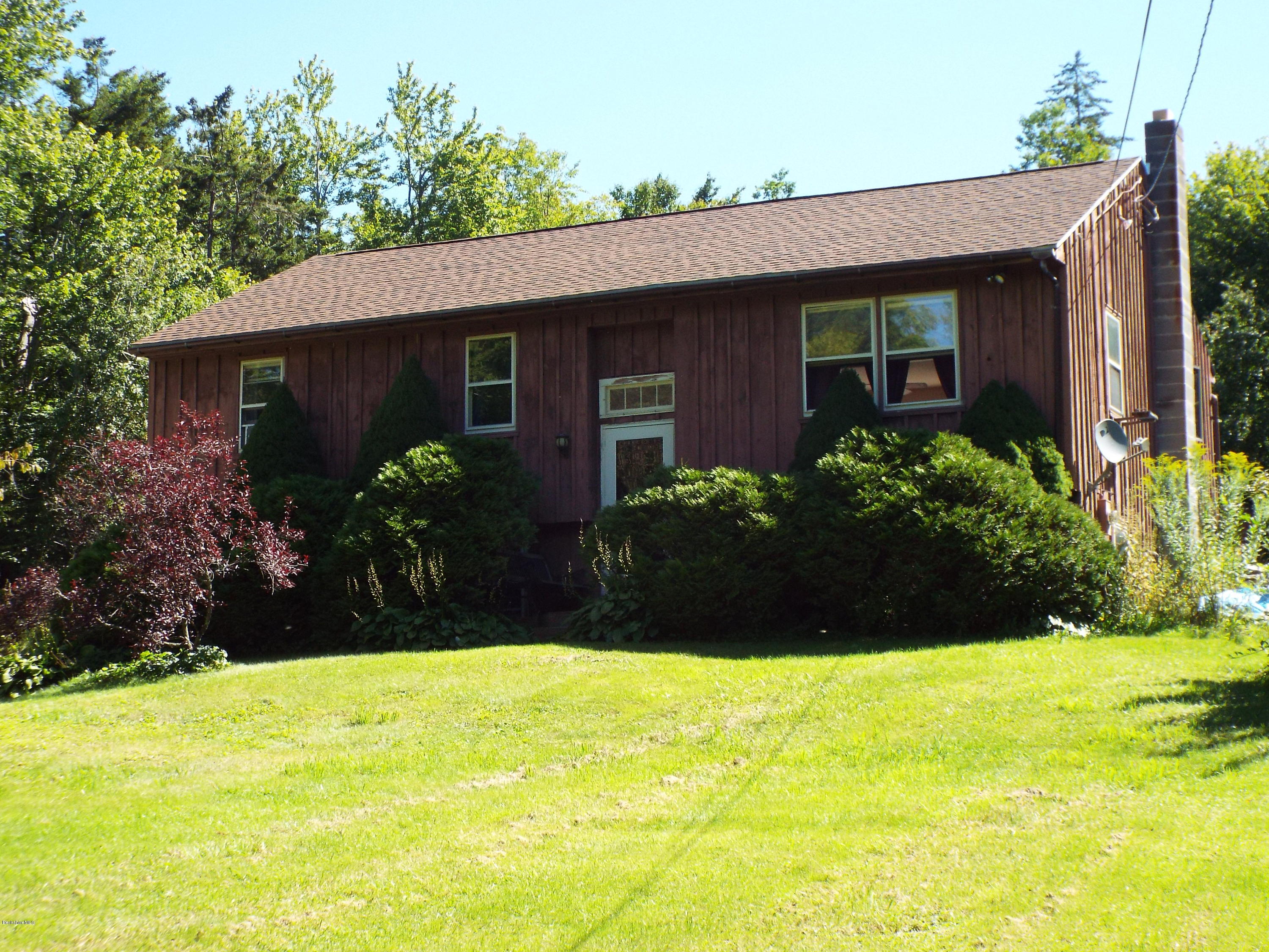 12 August Smith Road Peru, MA 01235 - Photo 1 of 11 a view of a house with pool and garden