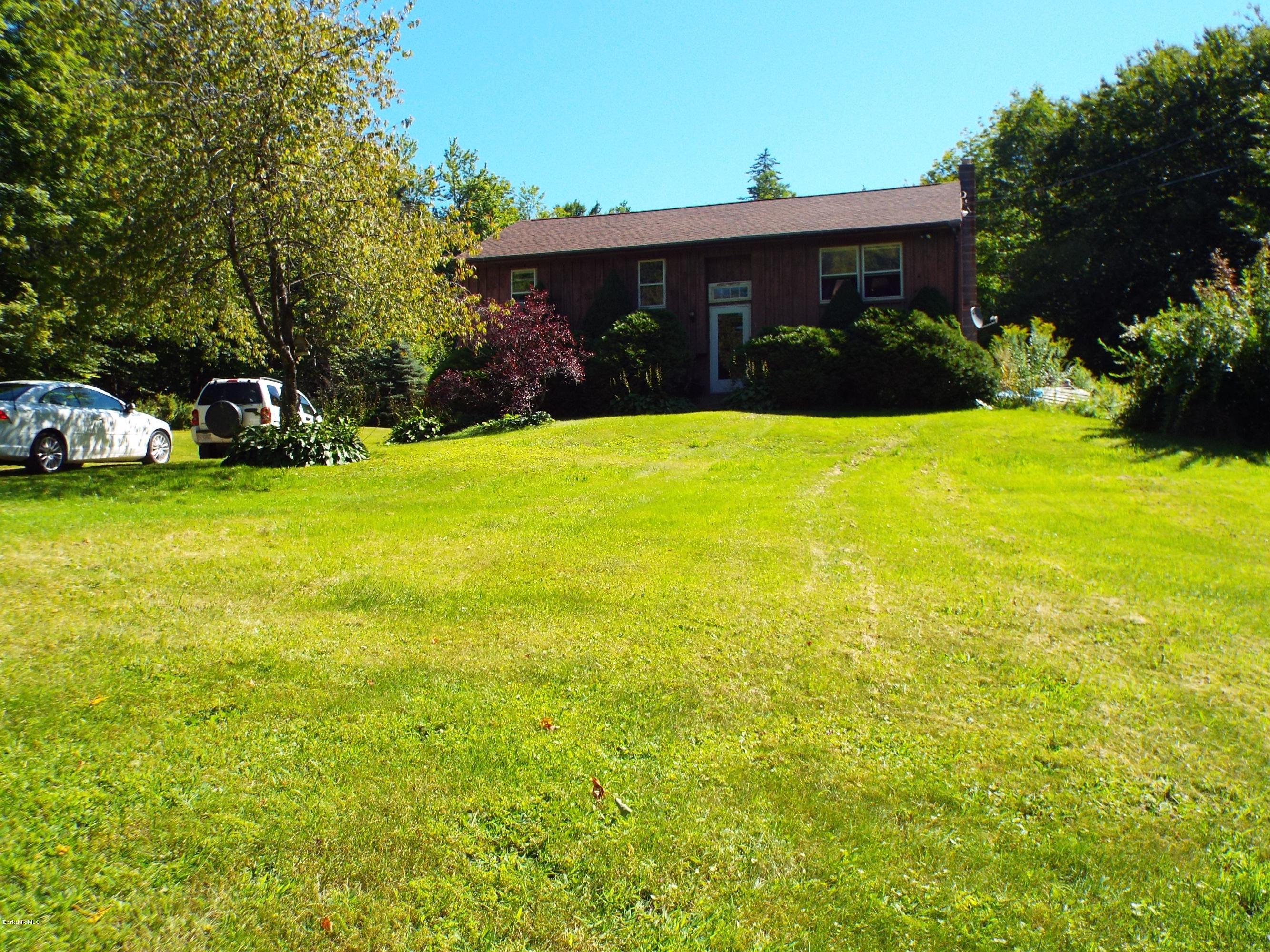 12 August Smith Road Peru, MA 01235 - Photo 2 of 11 a view of a house with a yard