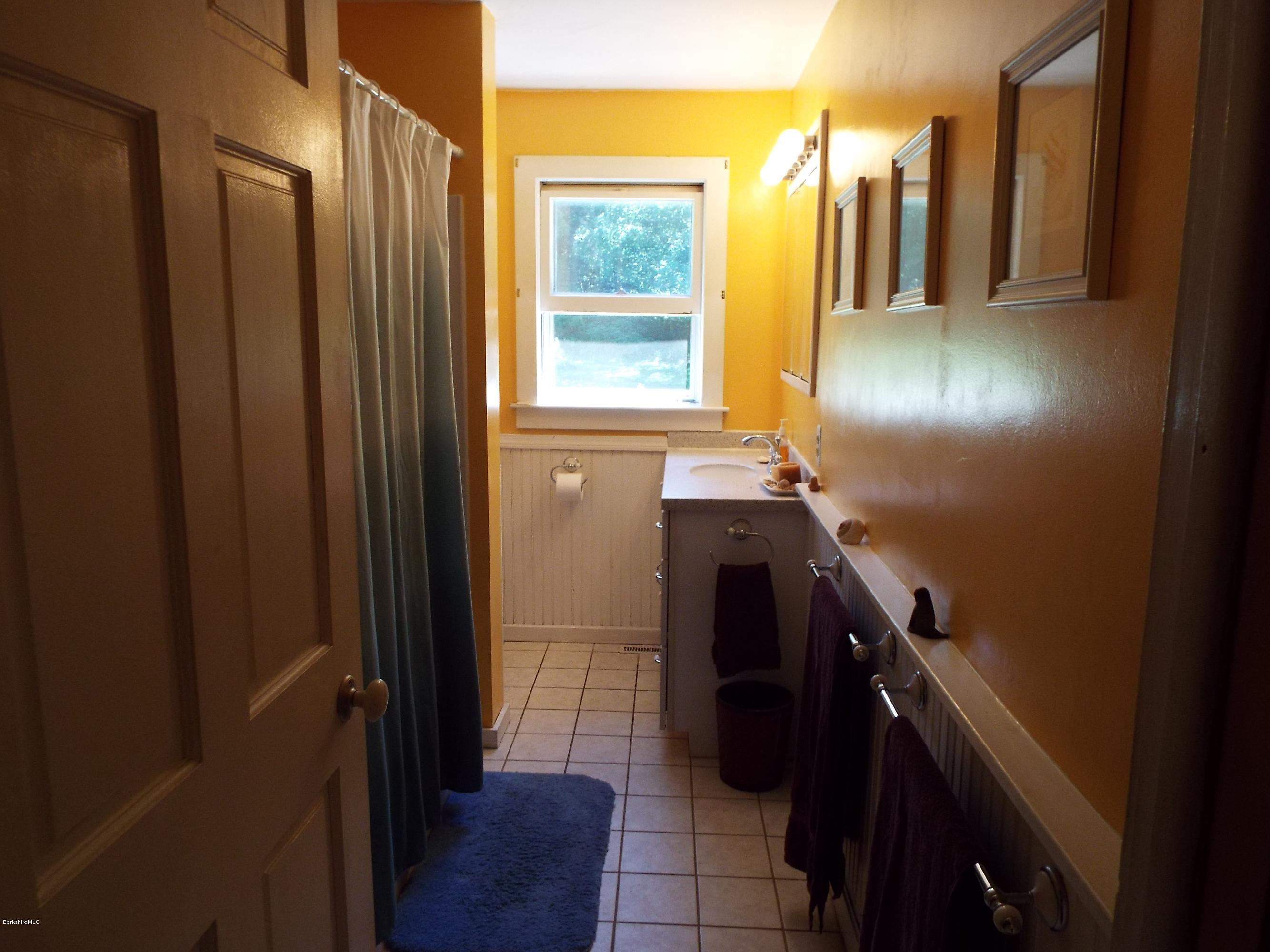 12 August Smith Road Peru, MA 01235 - Photo 9 of 11 a bathroom with a sink and a window