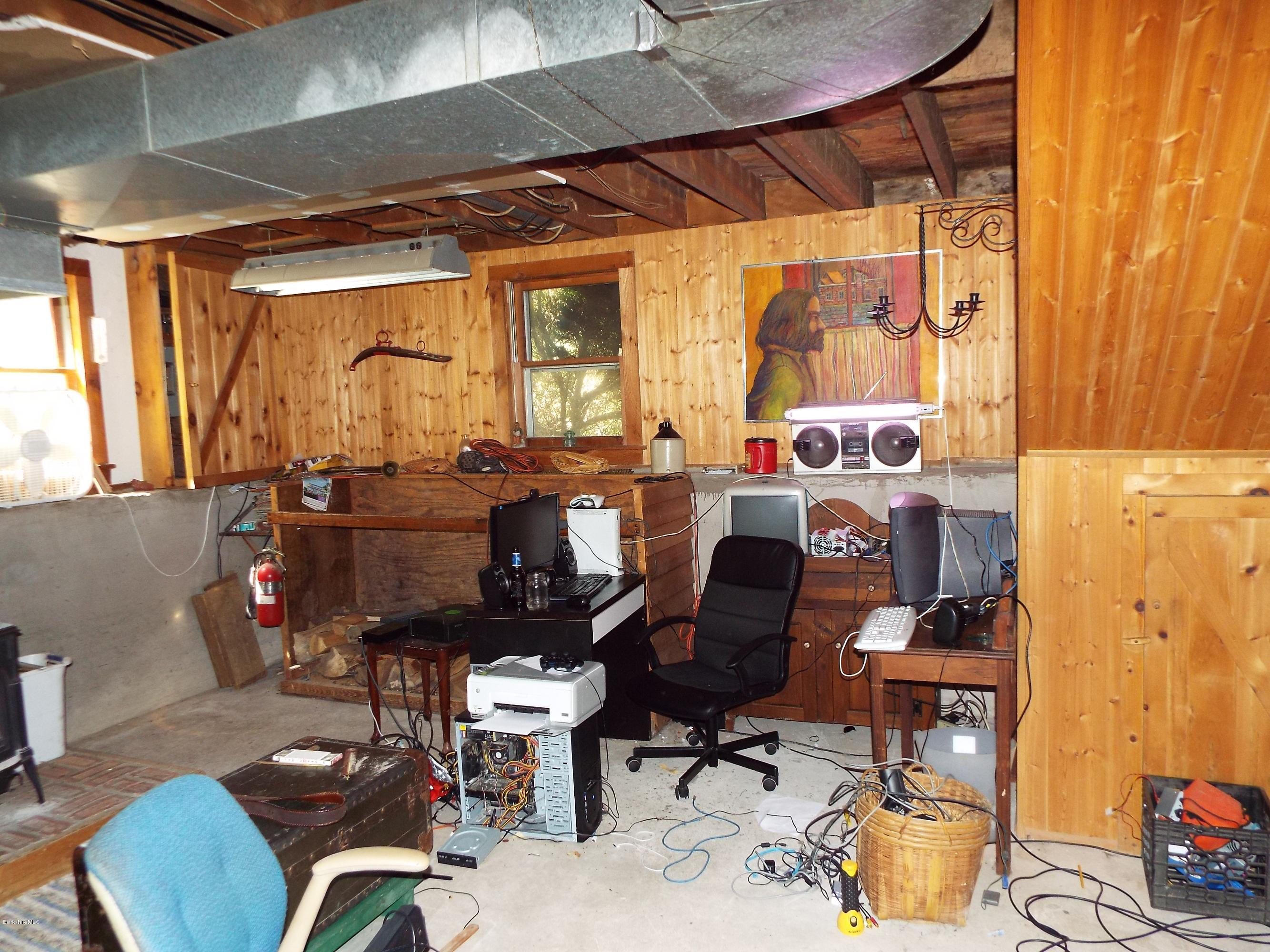 12 August Smith Road Peru, MA 01235 - Photo 10 of 11 a room with musical instruments
