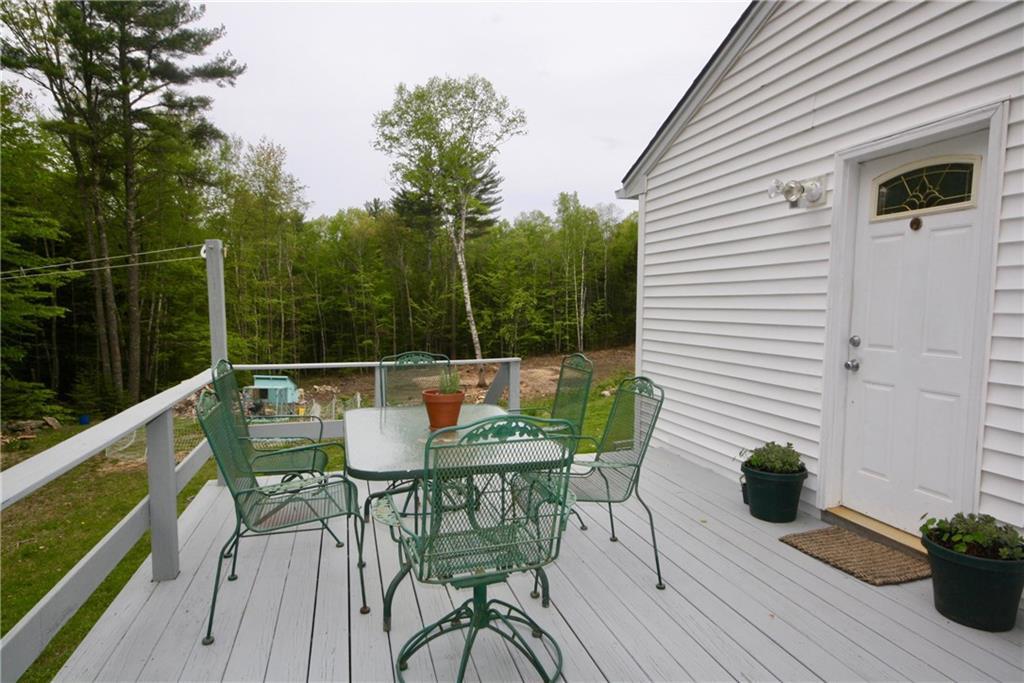 249 Mc Kay Road Edgecomb, ME 04556 - Photo 2 of 26 The sunny deck is great for relaxing.