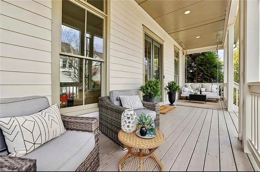 7345 Samples Field Road Cumming, GA 30040 - Photo 2 of 29 a outdoor space with patio the couches and a potted plant on a table with garden view