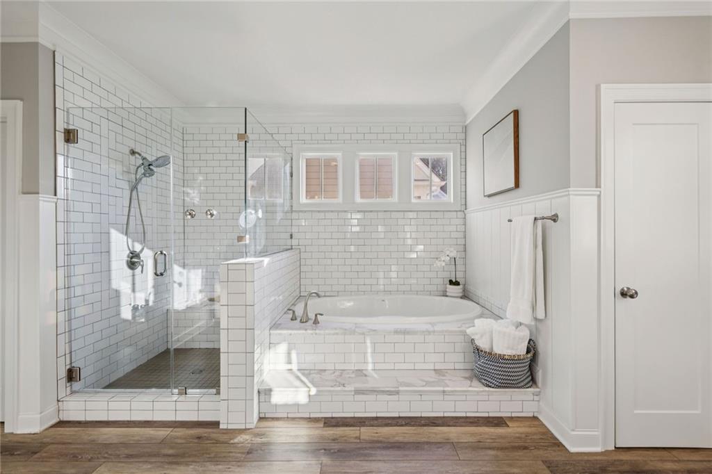 7345 Samples Field Road Cumming, GA 30040 - Photo 22 of 29 a bathroom with a shower