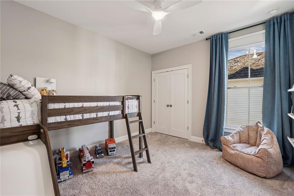 7345 Samples Field Road Cumming, GA 30040 - Photo 25 of 29 a view of room with furniture and windows
