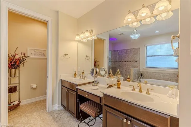 a bathroom with a sink double vanity and a mirror
