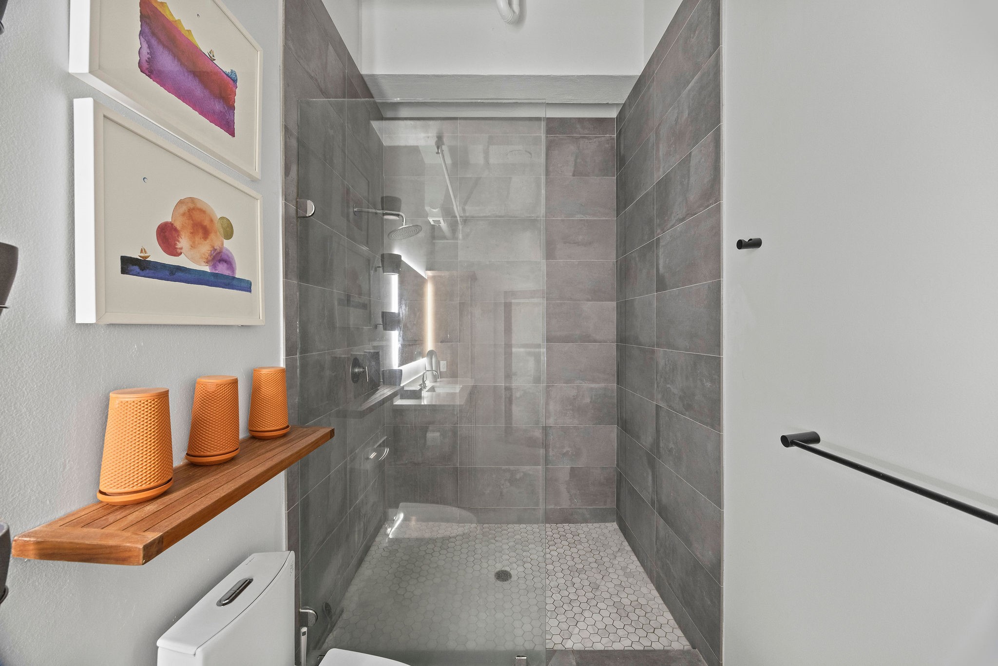 705 Main Street, Unit 516 Houston, TX 77002 - Photo 17 of 22 Spa-inspired oversized walk-in shower rarely found in comparable units.