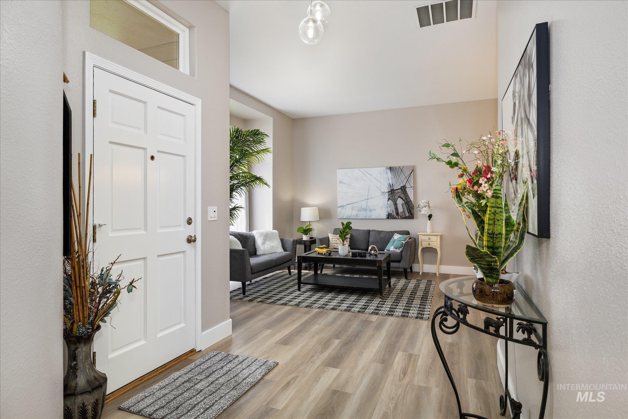 2250 North Amethyst Avenue Meridian, ID 83646 - Photo 4 of 50 Entryway featuring light wood-type flooring and baseboards