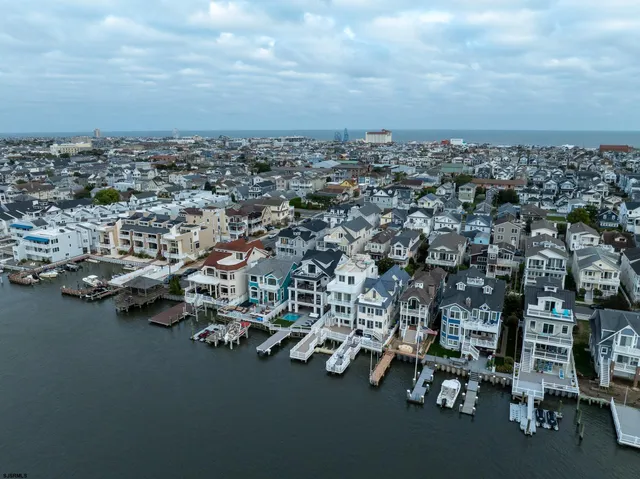 a bathroom with a sink toilet and mirror