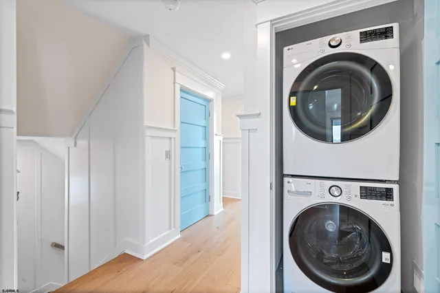 a bathroom with a granite countertop sink a shower and a mirror