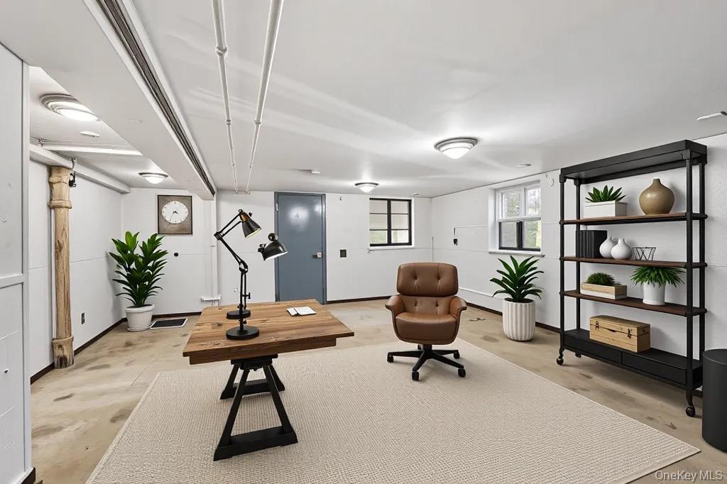 61-12 Main Street Queens, NY 11367 - Photo 12 of 35 Living area with baseboards