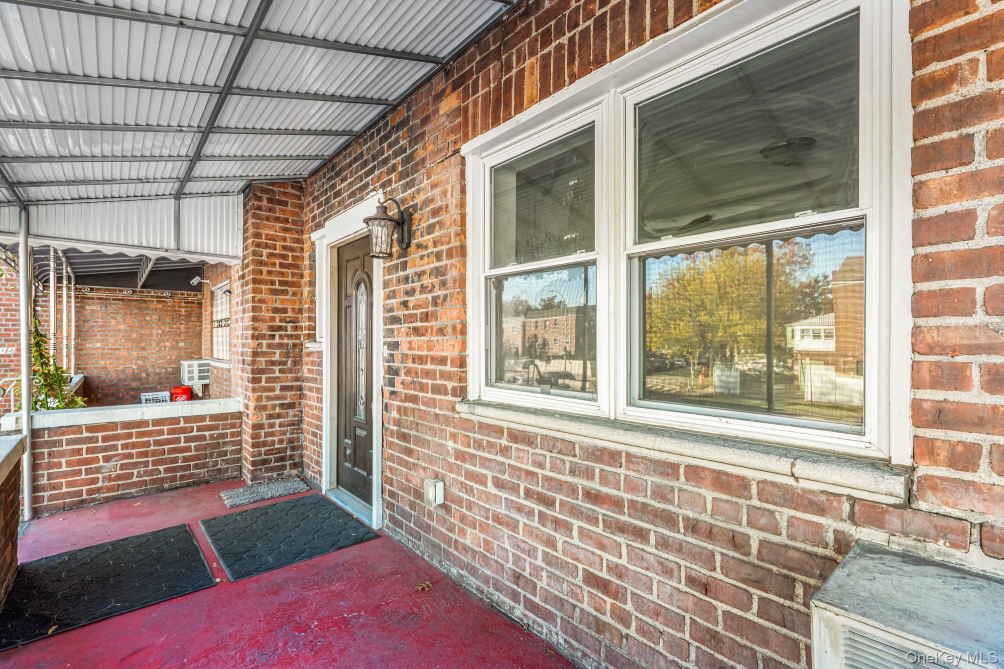 61-12 Main Street Queens, NY 11367 - Photo 30 of 35 View of porch