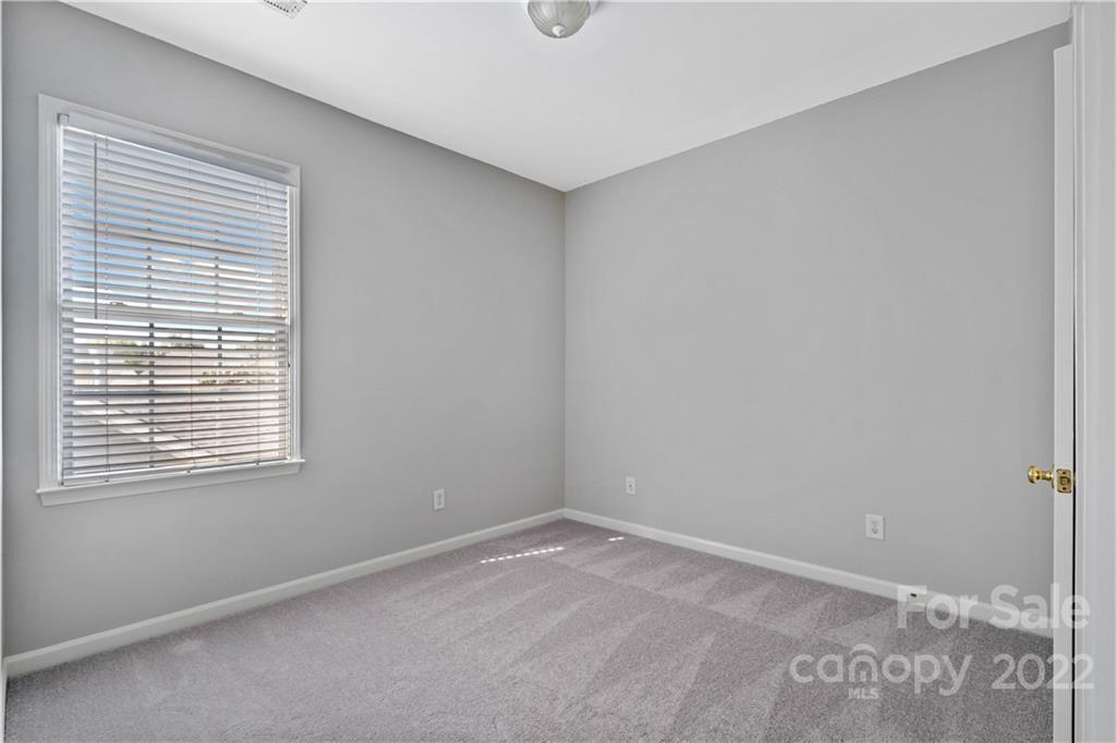 412 Third Baxter Street Fort Mill, SC 29708 - Photo 19 of 39 a room that has a window in it