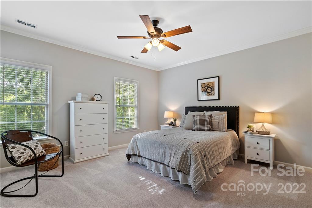 412 Third Baxter Street Fort Mill, SC 29708 - Photo 21 of 39 a bedroom with a bed and a window