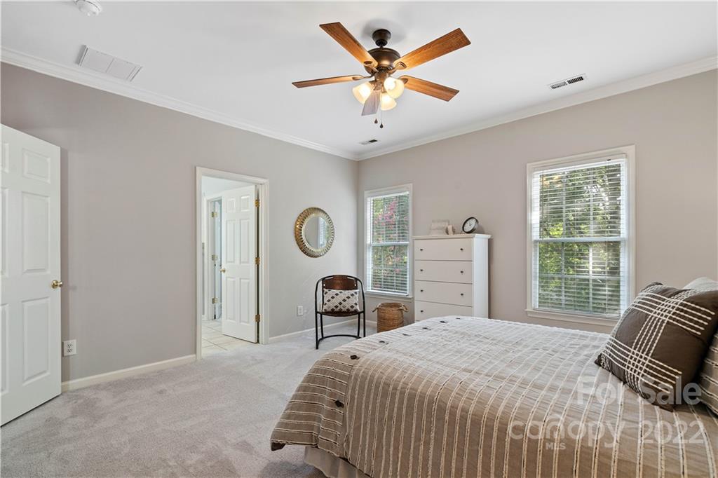 412 Third Baxter Street Fort Mill, SC 29708 - Photo 22 of 39 a bedroom with a bed and a large window