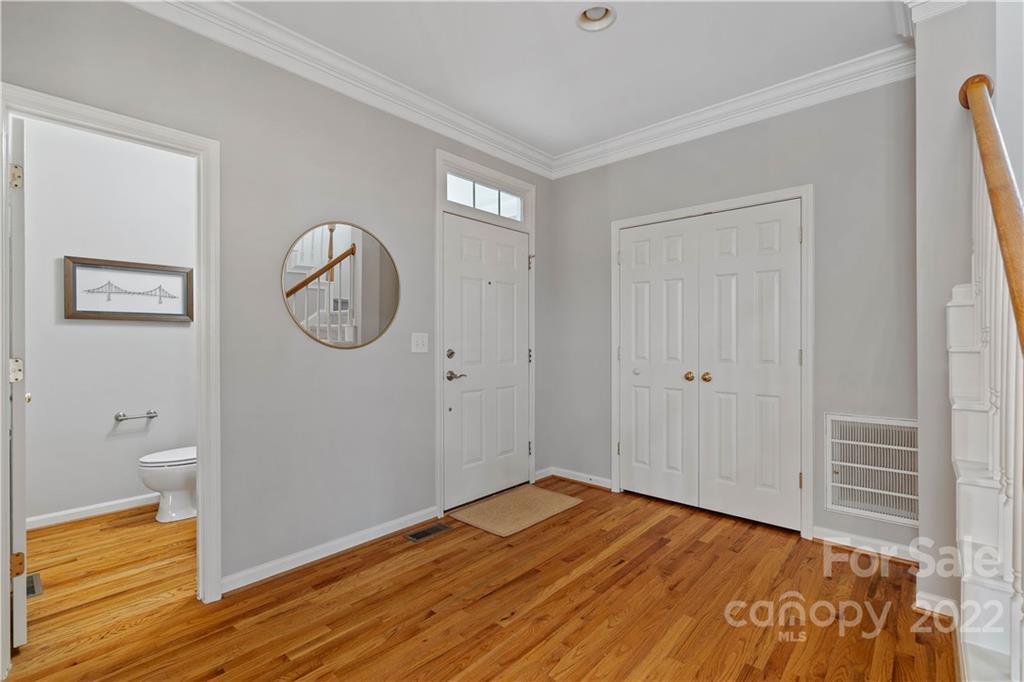 412 Third Baxter Street Fort Mill, SC 29708 - Photo 3 of 39 a view of a room with wooden floor and a bathroom