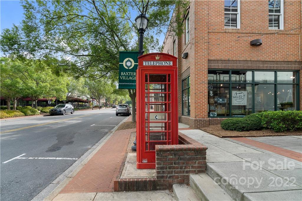 412 Third Baxter Street Fort Mill, SC 29708 - Photo 34 of 39 a front view of a building with a garden