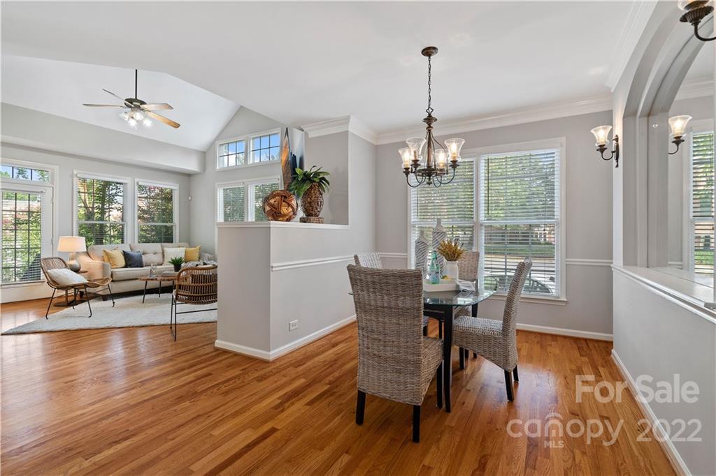 412 Third Baxter Street Fort Mill, SC 29708 - Photo 8 of 39 a view of a dining room with furniture window and wooden floor