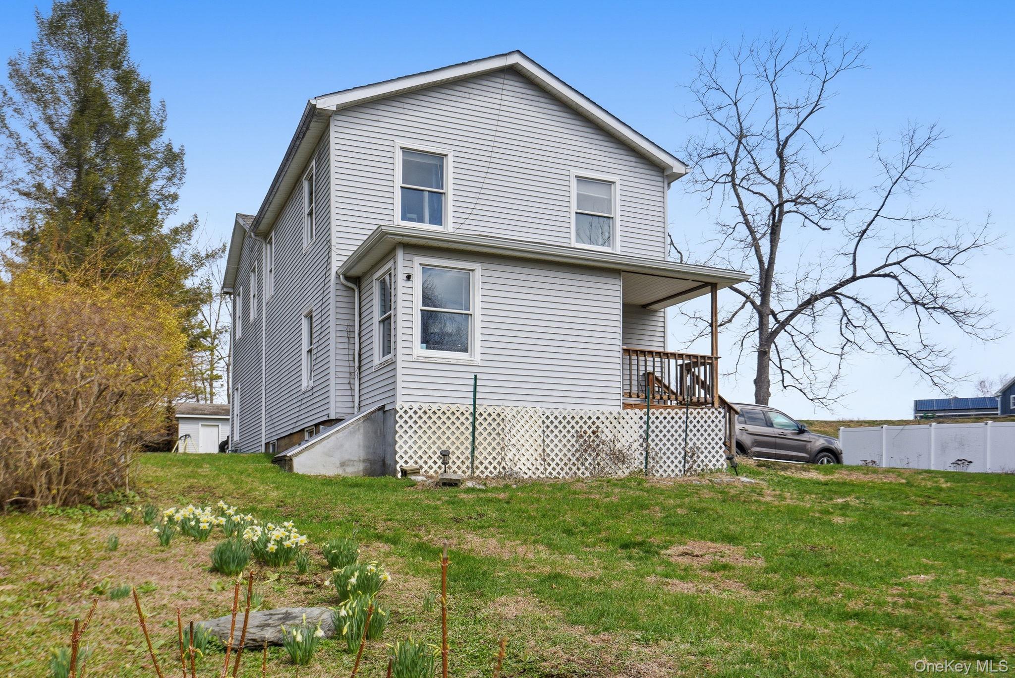 41 Beilke Road Millerton, NY 12546 - Photo 3 of 26 a view of a backyard with a garden