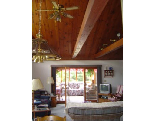406 Boston Road Groton, MA 01450 - Photo 7 of 13 a living room with furniture and a large window