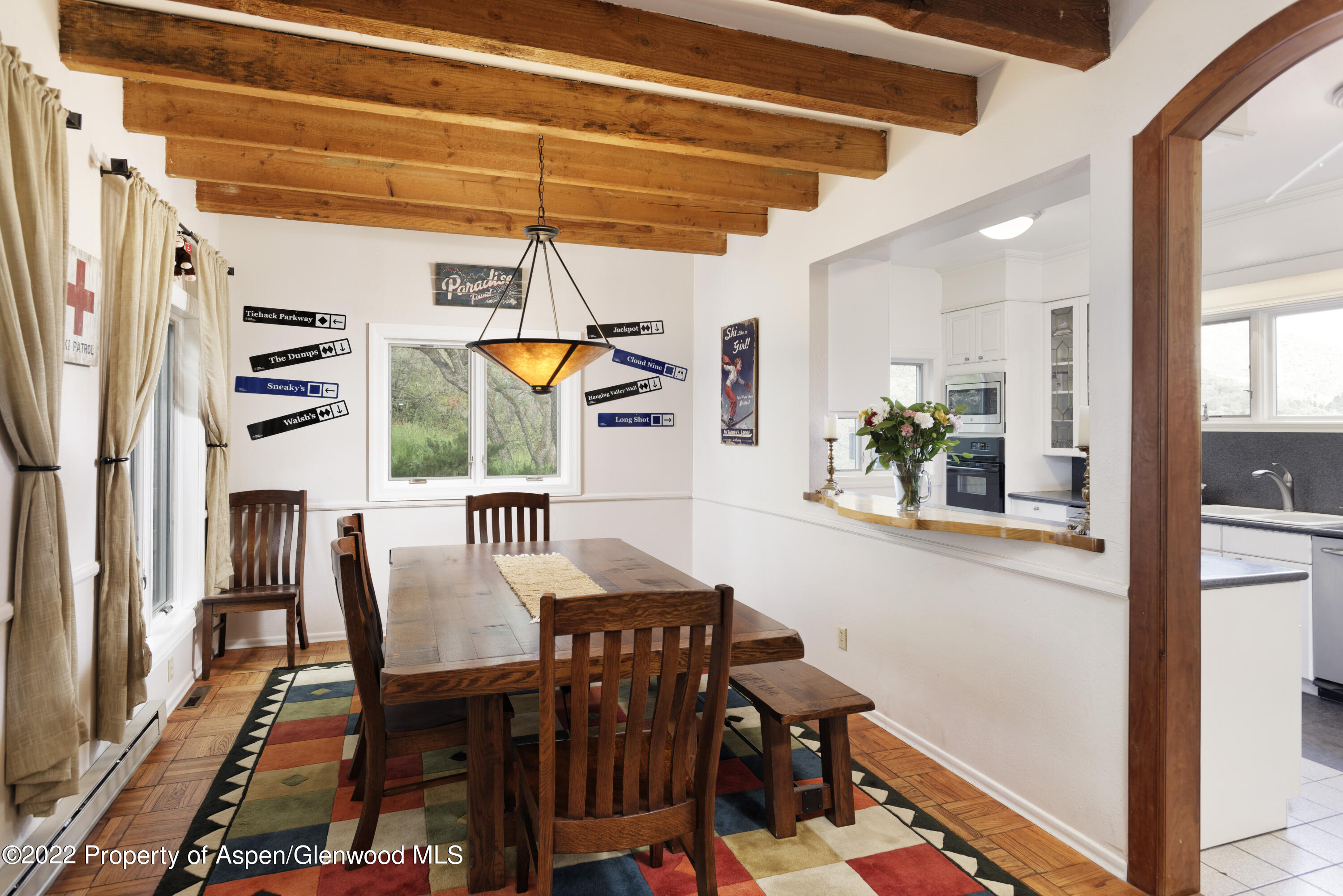 540 Upper Ranch Road Aspen, CO 81611 - Photo 8 of 24 a view of a dining room with furniture and window