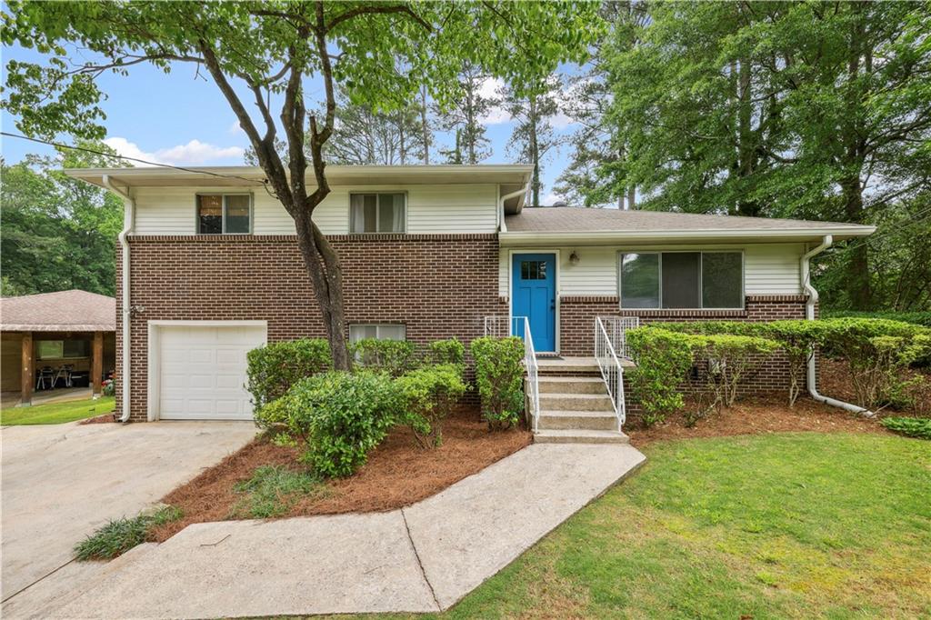 1602 Moncrief Circle Decatur, GA 30033 - Photo 1 of 1 front view of a house with a yard