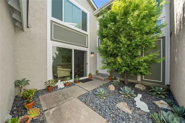 a view of a swimming pool with a lounge chairs