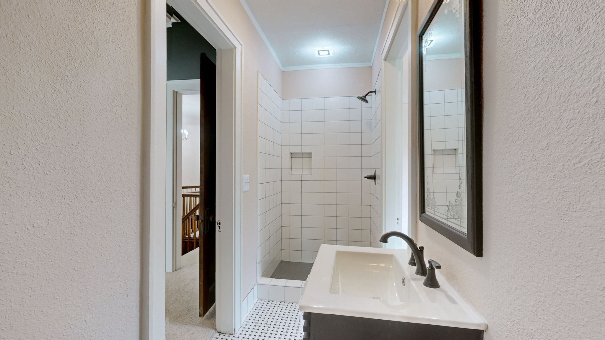 1007 Poplar Street Murray, KY 42071 - Photo 18 of 48 a bathroom with a sink and a mirror