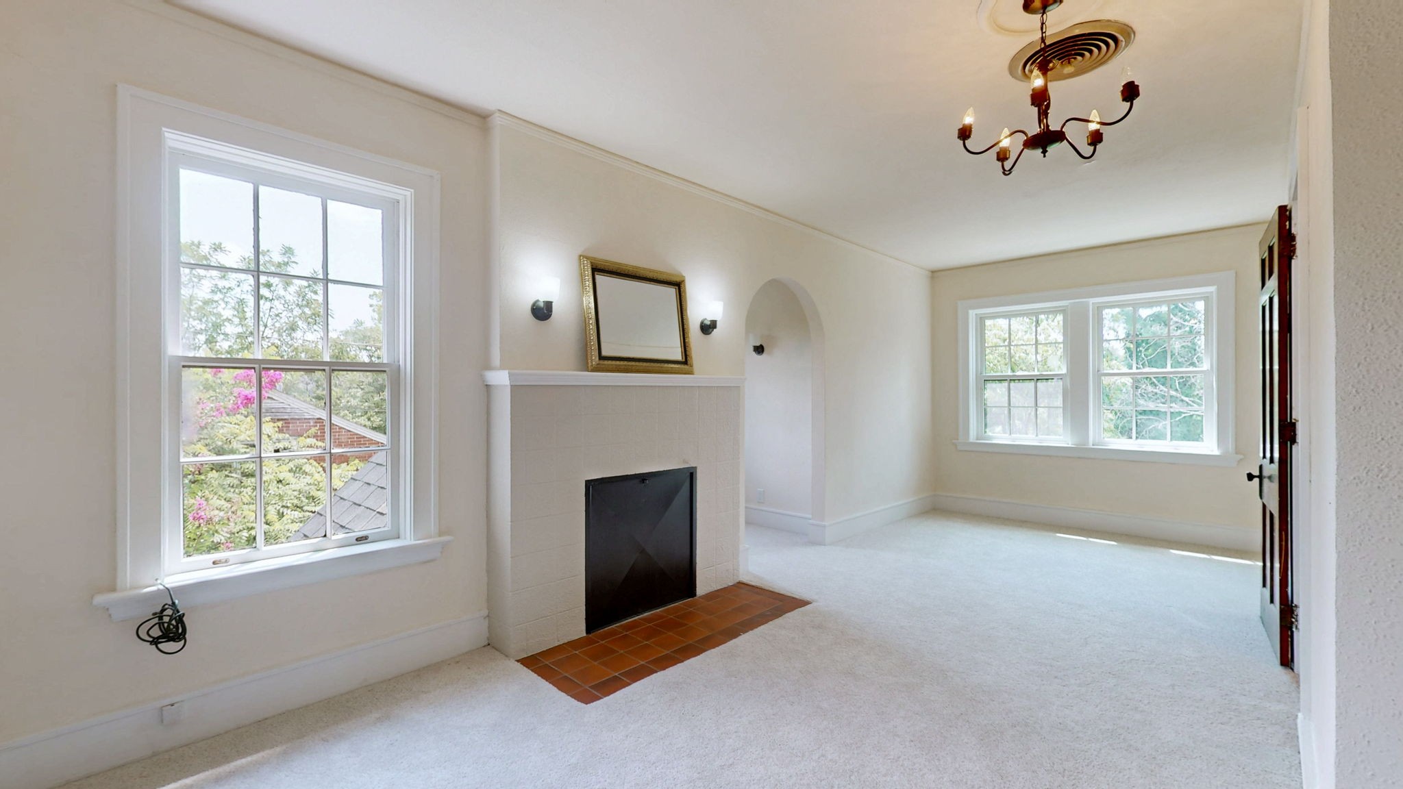 1007 Poplar Street Murray, KY 42071 - Photo 19 of 48 a view of livingroom with window fireplace and fan