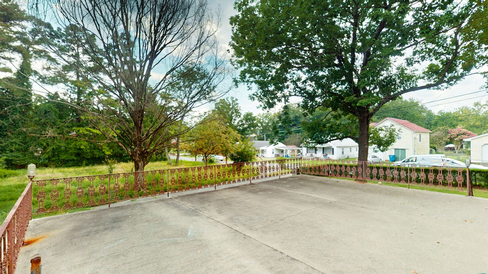 1007 Poplar Street Murray, KY 42071 - Photo 39 of 48 a view of a house with backyard and trees
